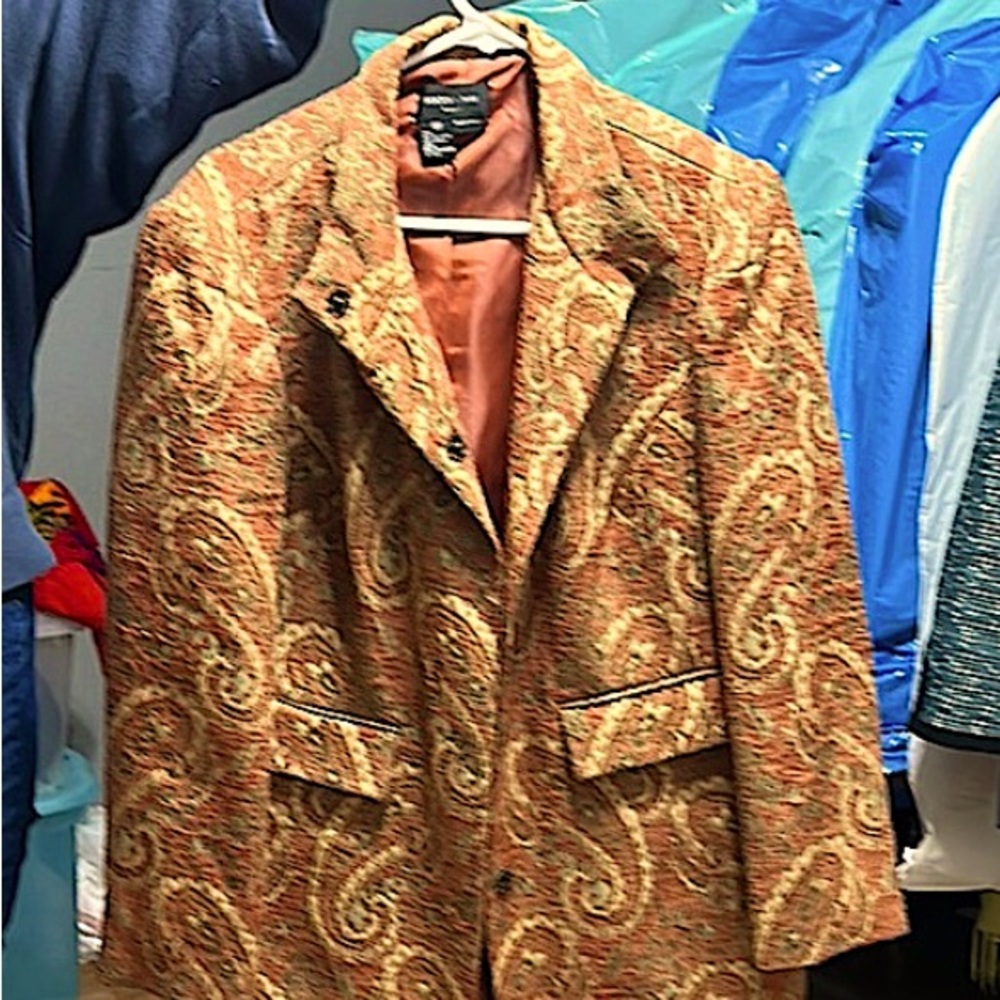 Stylish Coat with paisley design; faux pockets, quick snap to button up.